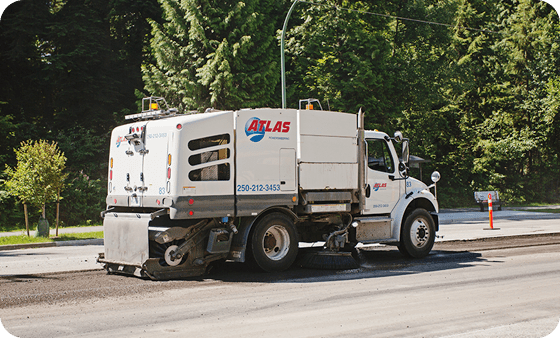 power sweeping truck at construction site 